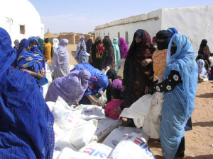 Saharawi_refugee_women_with_flour_in_Dakhla,_Algeria